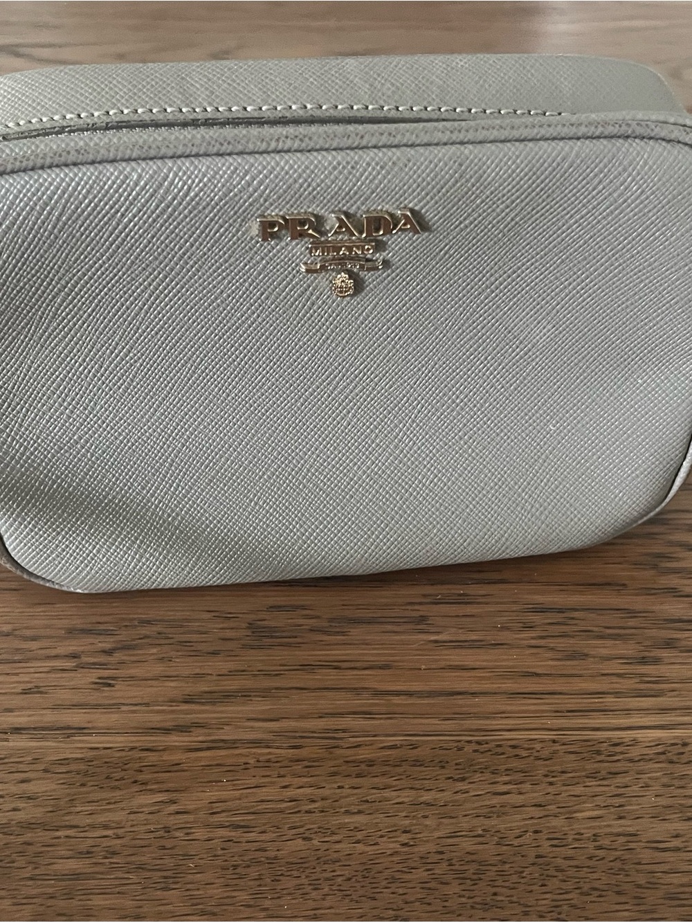 Prada mini saffiano crossbody Leather in Pale Gray with Gold Logo